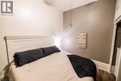 Hardwood-finish flooring complements the room's neutral wall tones - 