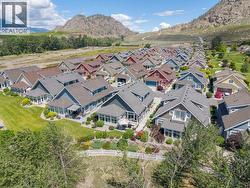 Aerial view backing onto green space - 