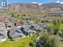 Aerial view backing onto green space - 