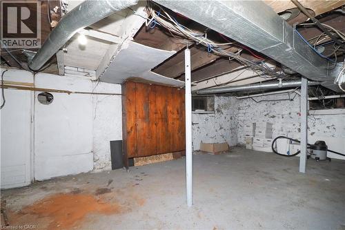 Concrete flooring with exposed ceiling joists and ductwork - 731 King Street E, Cambridge, ON 