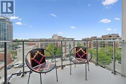 Private balcony with a concrete surface and clear glass railing - 