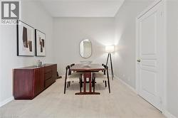 Neutral-toned walls complement the light-colored carpeting - 