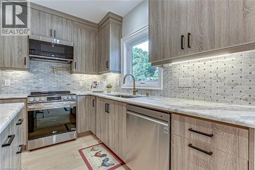 Granite Counters in Kitchen - 33 Tyrell Street, Simcoe, ON - Indoor Photo Showing Kitchen With Upgraded Kitchen