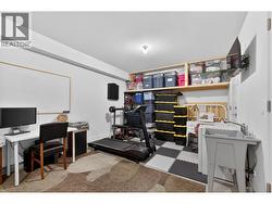 Flexible rear garage space with the potential to be enclosed into a separate room, making it ideal for a home office, gym, hobby room, or additional storage. - 