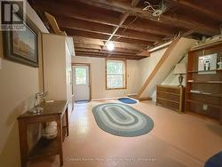 Lower level living area with walk to the backyard - 