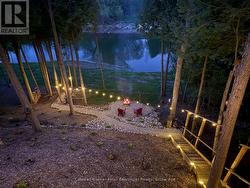 View of the campfire spot & river at night - 
