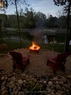 Evening campfire overlooking the river - 
