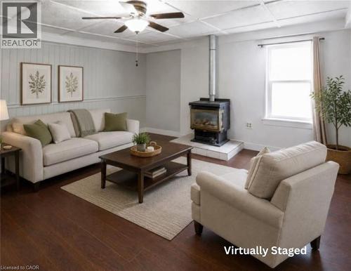 Virtually Staged - 9 Marshall Lane, Simcoe, ON - Indoor Photo Showing Living Room With Fireplace