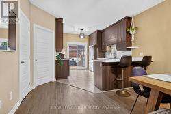 Well appointed kitchen with access to backyard. - 