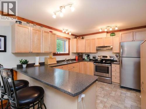 400 Ursa Way, Whitehorse North, YT - Indoor Photo Showing Kitchen With Double Sink