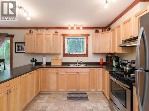 400 Ursa Way, Whitehorse North, YT - Indoor Photo Showing Kitchen With Double Sink