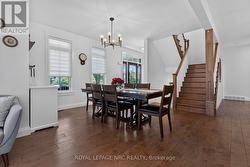 Wide staircase strategically tucked away. - 