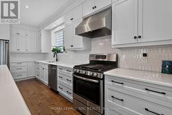 Gleaming stainless steel appliances. - 