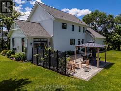 Backyard patio and pergola. - 