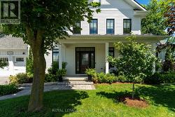 Mature trees and perrenial plantings. - 