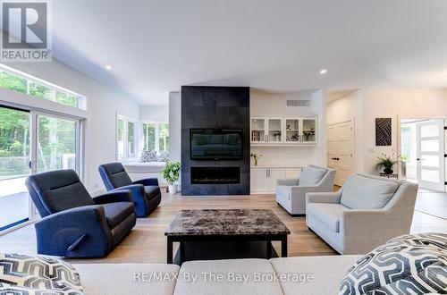 Living Room with Gas Fireplace and Reading Nook - 95 Spruce Street, Tiny, ON 