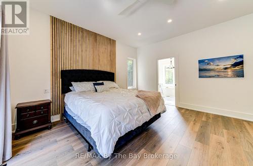 Primary Bedroom with Feature Wall - 95 Spruce Street, Tiny, ON 