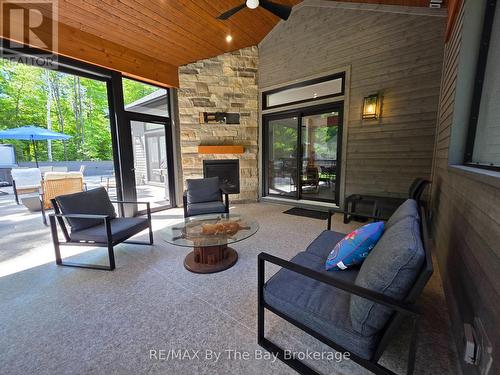 Porch with Screen Open for Access to Deck Area - 95 Spruce Street, Tiny, ON 