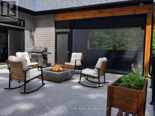 Sitting Area on Deck with Gas Fire Pit - 95 Spruce Street, Tiny, ON 