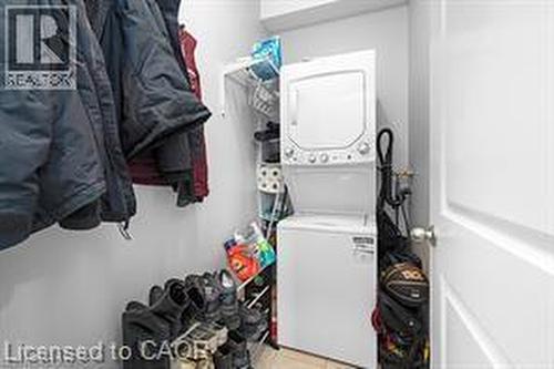 Unit 1 laundry room and storage area as you walk in. Floor plans available. - 146 Forest Avenue, Hamilton, ON 