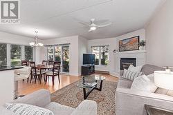 End unit with lots of natural light. - 