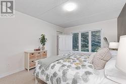 Primary bdrm with w/o to deck. - 