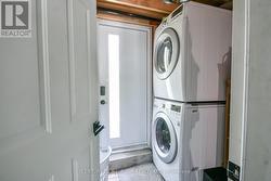 Shared back entrance & laundry room. - 