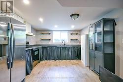 2nd kitchen with new, large egress window. - 