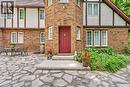 Brick and stucco facade with timber accents - 110 Grand Ridge Drive, Cambridge, ON 