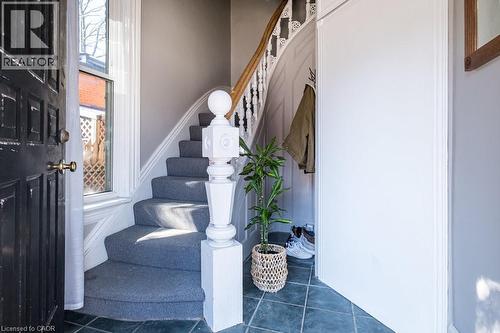 Main floor entrance to the second level unit. All three units feature their own private entrances, offering added privacy and independence for each resident. - 270 Queen Street S, Hamilton, ON 