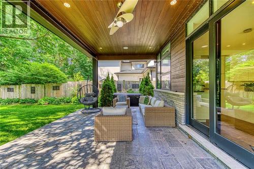Covered patio featuring wood-finish ceiling, recessed lighting, and a ceiling fan - 2104 Devon Road, Oakville, ON - Outdoor With Deck Patio Veranda With Exterior