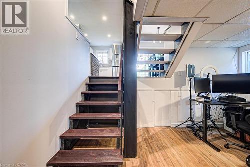 Wood-finish flooring with white wall paneling - 154 Grand Avenue S, Cambridge, ON 
