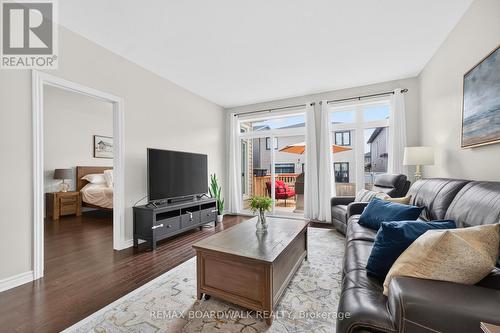 Patio Door to the New Deck '26 & Fully Fenced Yard - 224 Maygrass Way, Ottawa, ON - Indoor Photo Showing Living Room