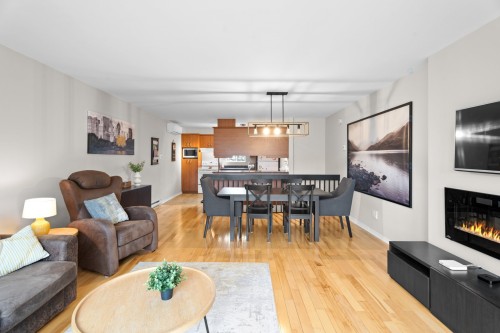 Salon - 122 Av. Hochar, Saint-Sauveur, QC - Indoor Photo Showing Living Room With Fireplace