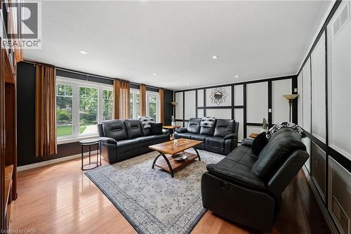 Hardwood-style flooring throughout the room - 39 Elodia Court, Hamilton, ON 