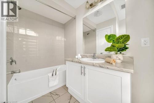 Bathroom with bathtub / shower combination and vanity - 285 Broadacre Drive, Kitchener, ON 