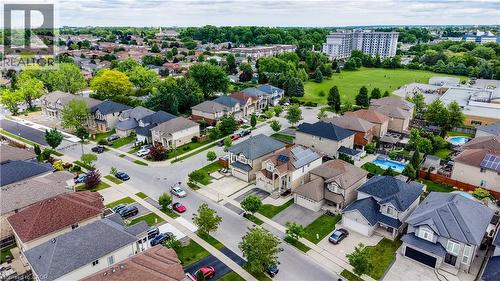 Aerial view of a residential neighborhood featuring detached homes on tree-lined streets - 37 Davinci Boulevard, Hamilton, ON 