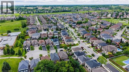 Expansive residential community featuring diverse architectural styles, paved streets, and abundant green spaces - 37 Davinci Boulevard, Hamilton, ON 