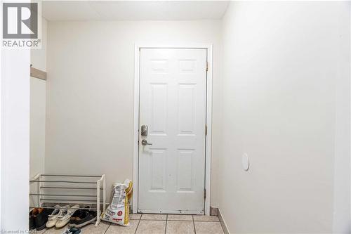 Upper level view inside main entrance foyer (now vacant) - 1519 Howland Avenue, London, ON 