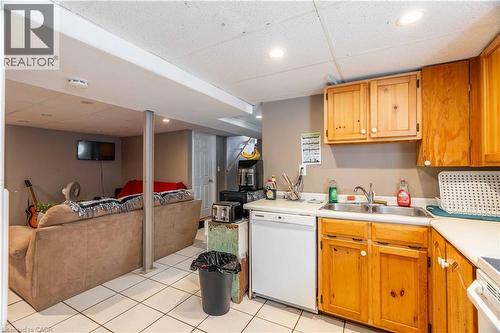 lower level kitchen w/ view to laundry room - 1519 Howland Avenue, London, ON 
