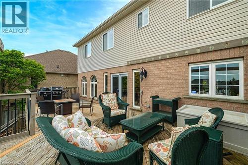 Expansive wood deck with a full railing system - 26 Shadyridge Place, Kitchener, ON 
