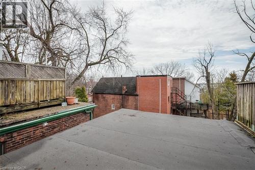Rooftop deck featuring wood privacy fencing and trellises - 41 Springhurst Avenue, Toronto, ON 