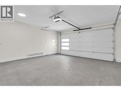 Heated Double Car Garage with EV Charger Hookup - 