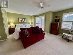 Primary suite with walkout to upper riverside deck - 