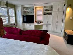 Primary suite with built in cabinets - 