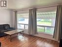 Front-facing windows with crown molding and wood-finish flooring - 110 Peppler Street, Waterloo, ON 