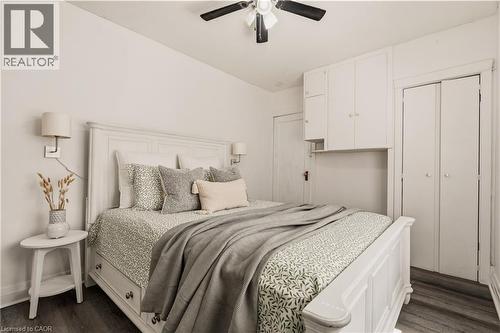 Main house: Bedroom 1 with built in storage - 148 Huxley Avenue S, Hamilton, ON 