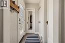 Main house: Inviting entry with coat closet. - 148 Huxley Avenue S, Hamilton, ON 