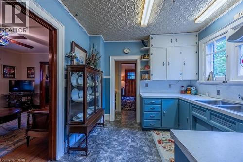 Butler's Pantry looking toward the front door with Dining Room to the left - 72 Crescent Boulevard, Simcoe, ON - Indoor Photo Showing Kitchen With Double Sink