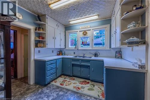 Butler's Pantry featuring tin ceiling, off of the Dining Room and Kitchen - 72 Crescent Boulevard, Simcoe, ON - 